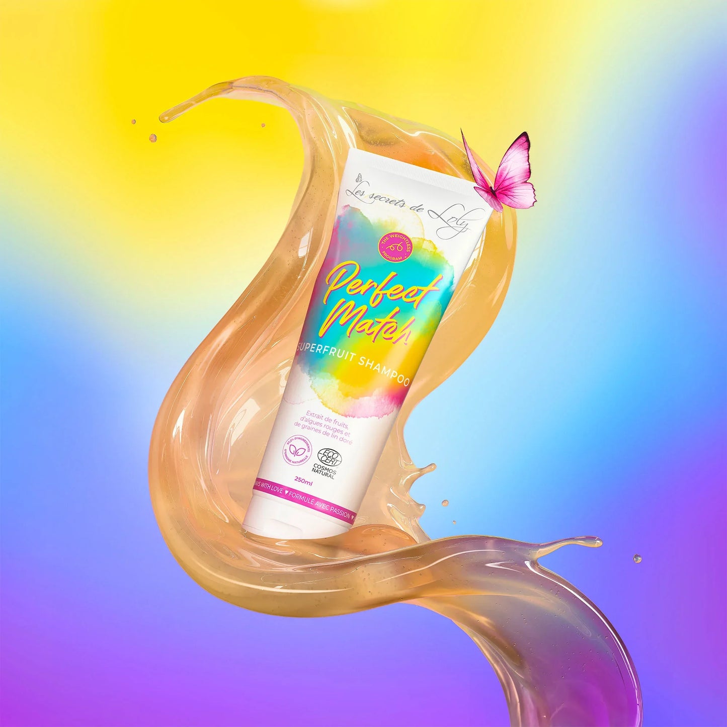 Superfruit shampoo tube with rainbow label, butterfly, and swirling liquid on colorful background