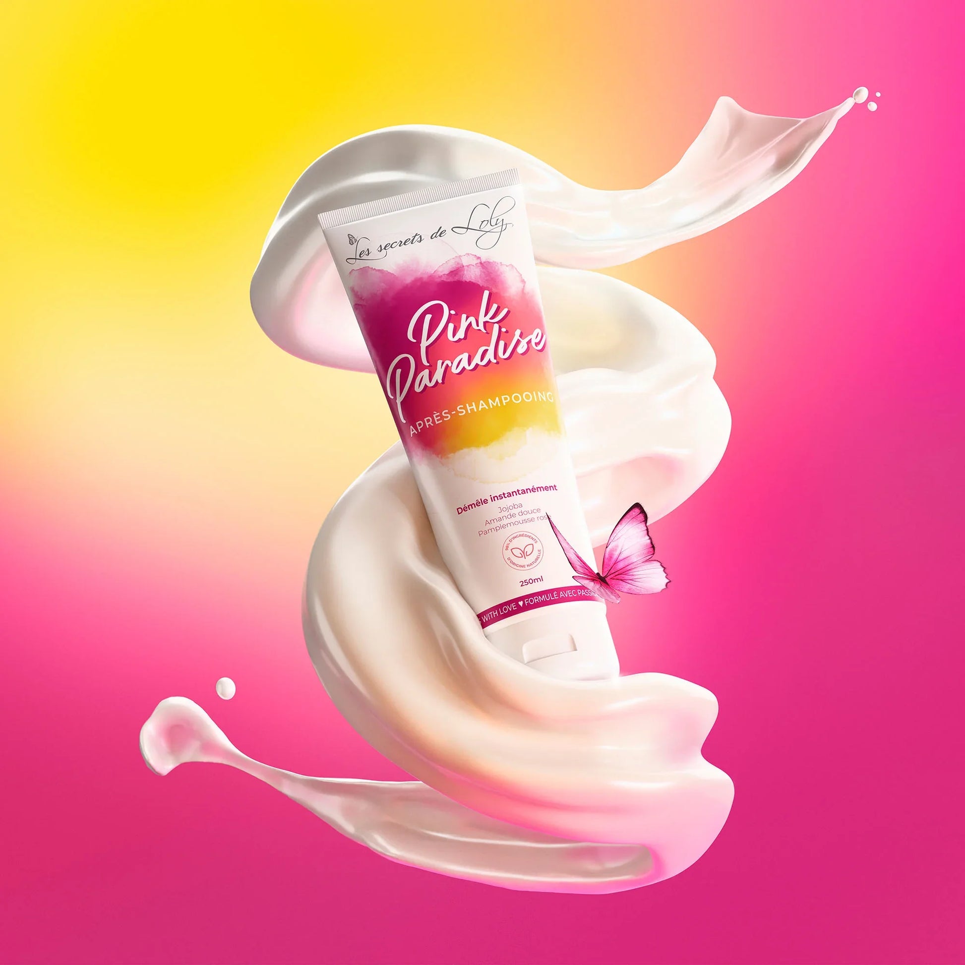 Pink Paradise conditioner tube with creamy swirls and butterfly on a pink and yellow background