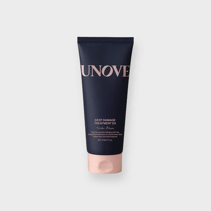 UNOVE Deep Damage Treatment EX hair care tube with pink cap on white background