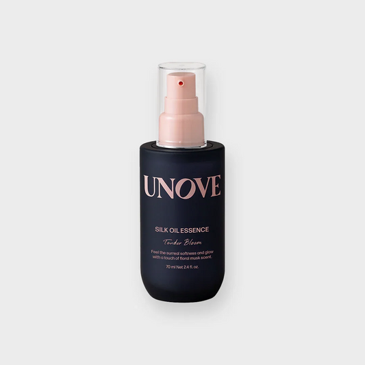 UNOVE Silk Oil Essence hair serum bottle with pump on plain background