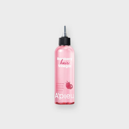 A'Pieu Raspberry Hair Vinegar pink bottle with black cap on white background